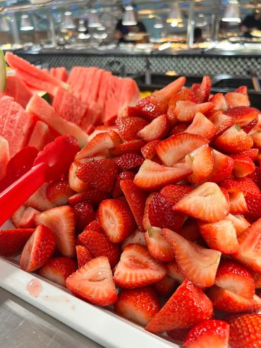 Sliced strawberries and watermelon