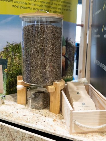 Wildflower seed display on an award-winning sustainable trade show stand