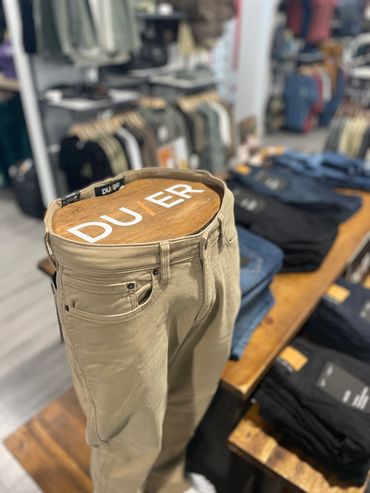 Detail of custom mannequin display for DUER retail installation at surf shop built by Rebuild Events