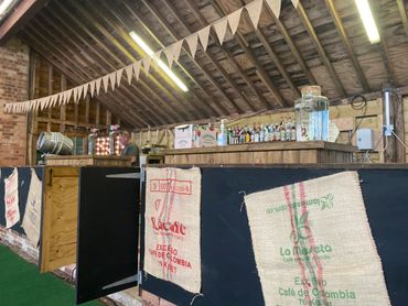 Rustic vintage wooden mobile bar, Powderham Castle, Devon