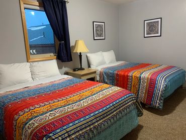 Bedroom with two full size beds.