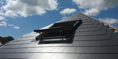 Slate effect fibre cement tiled roof Isle of Wight