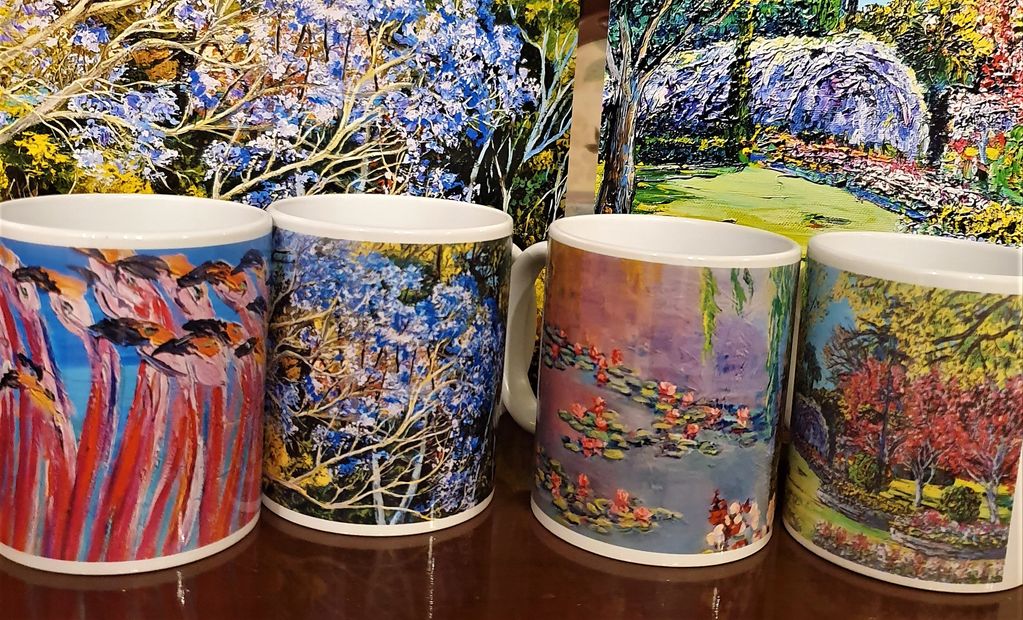 Artisan coffee cups with images of artwork