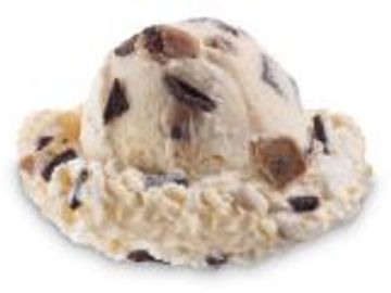 Cookie Dough Pieces and Chocolate Chips blending in Cookie Dough flavored Ice Cream