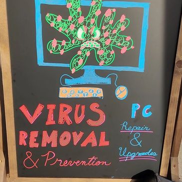 virus removal and prevention sign also mentioning PC repair and upgrades 