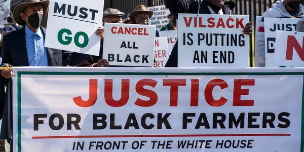 Black Farmers and their supporters demonstrate outside of The White House in March 2023.