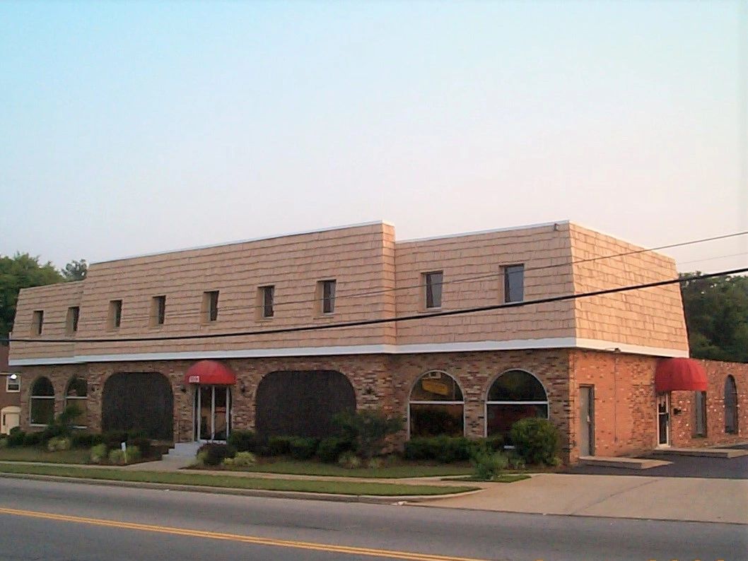 This is our office building.  We are located on the second floor a 6503 Old Branch Avenue, Suite 202