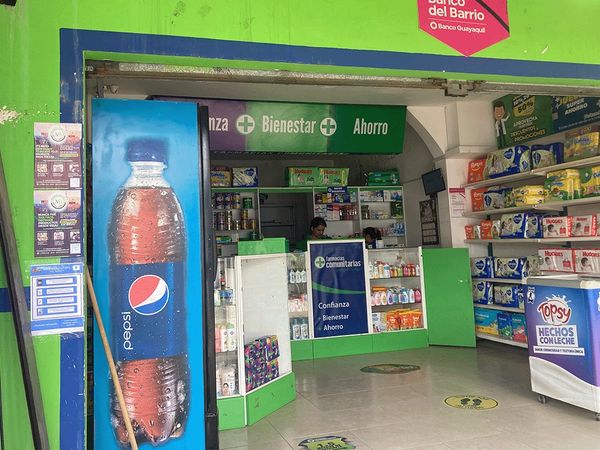 photo of pharmacy with a flier in  the window