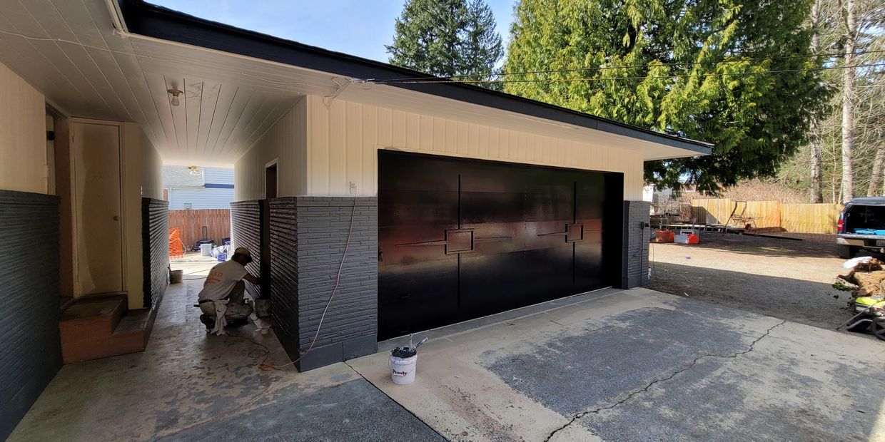 Professional house painters refreshing Pierce County, WA, home exterior trim