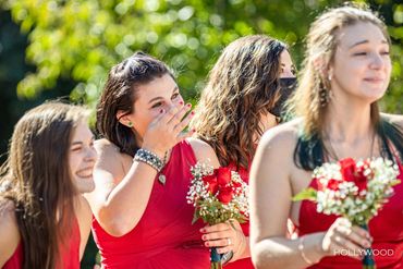 The Bridesmaids can't keep back the tears of joy as they look on to the ceremony.