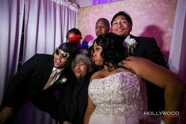 Wedding guests posing for a fun photo booth picture at Aria in Prospect, Connecticut.