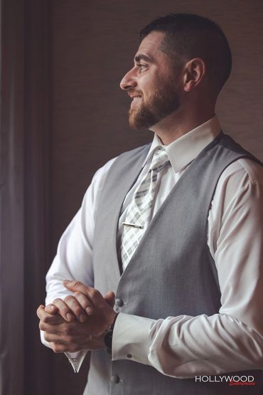 A groom proud, excited, and full of wonder as he gets ready for his wedding day.