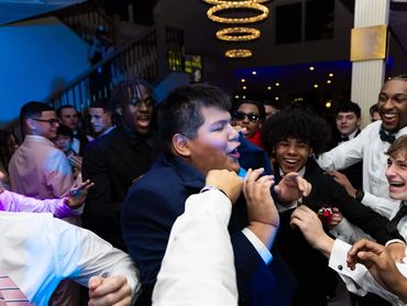 Students celebrating on the dance floor at prom at Anthony’s Ocean View in New Haven, Connecticut.