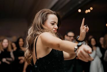 Wedding guest dancing at a reception at Aqua Turf in Southington, Connecticut.