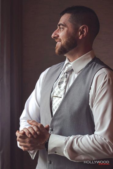 A groom proud, excited, and full of wonder as he gets ready for his wedding day.