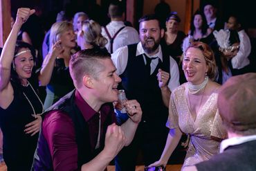 groom dancing and singing with his guests at his wedding, partying with Hollywood DJs & Production