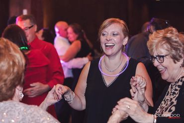This heartwarming photo perfectly illustrates the inclusive and joyous atmosphere we create.