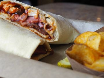 A delicious 3 meat bbq panino with kettle chips