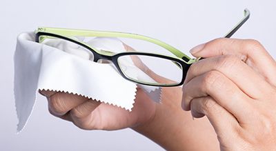 cleaning eye glasses