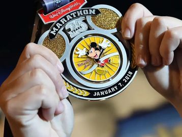 Medal for Walt Disney World Marathon 2018 with Mickey Mouse.