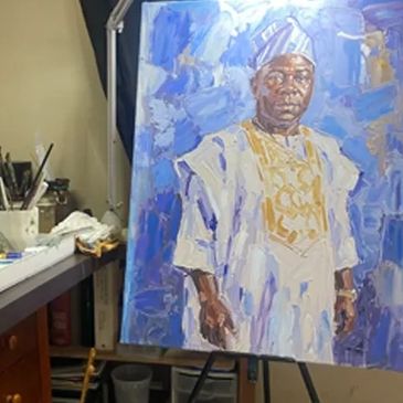 Portrait painting of a man in traditional attire.