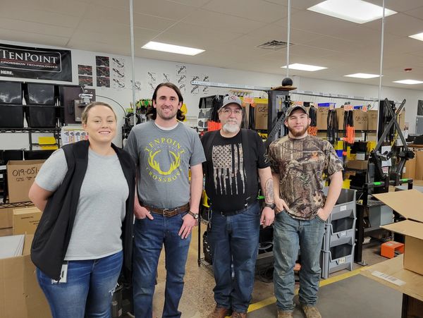 Our Bow techs in the middle with TenPoint  service technicians.