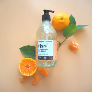 Image of a bottle of Miniml brand sweet clementine hand soap with clementines.