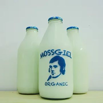 image of three glass bottles of Mossgiel brand organic milk