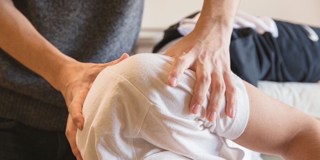 Gabriele Giordano treating shoulder pain on a patient in our regent street osteopathy clinic