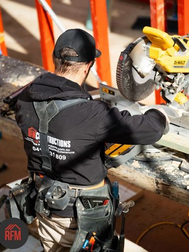 RFM team member working on Newport new home framing