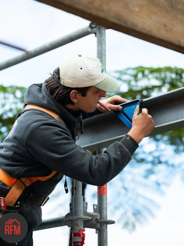RFM team member working on Newport new home framing