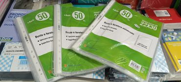 Packs of 50 universal punched document sleeves with heavy thickness and smooth surface.