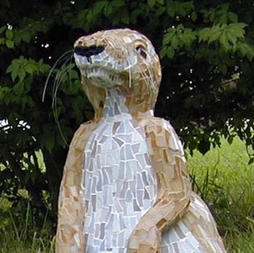 Prairie Dog Mosaic.  Bowling Ball, ceramic, stained glass, adhesives, taxidermy eyes, fishing line, 