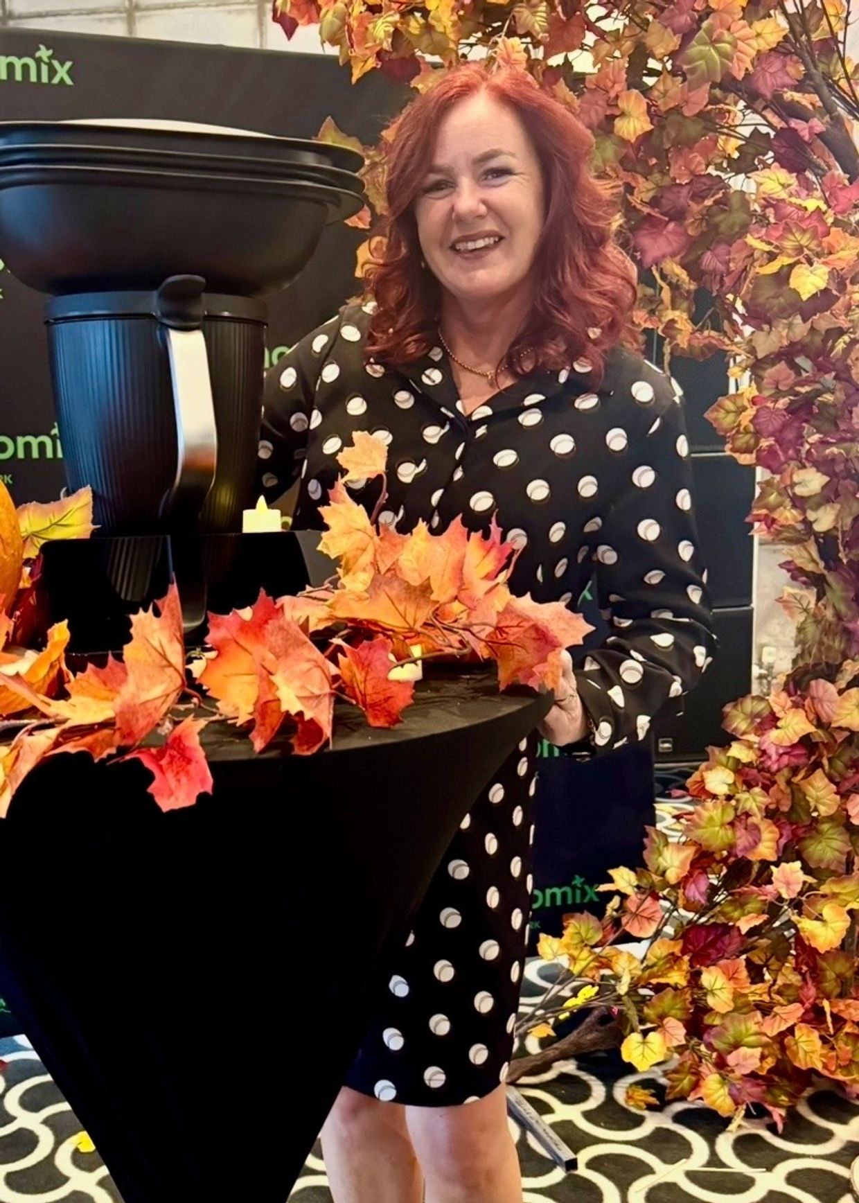Sara - Independent Thermomix Advisor smiling beside autumn leaves and a Thermomix.