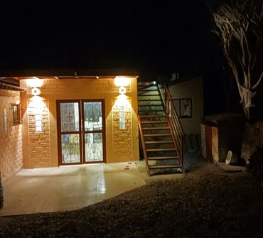 Back door to kitchen and upper deck.