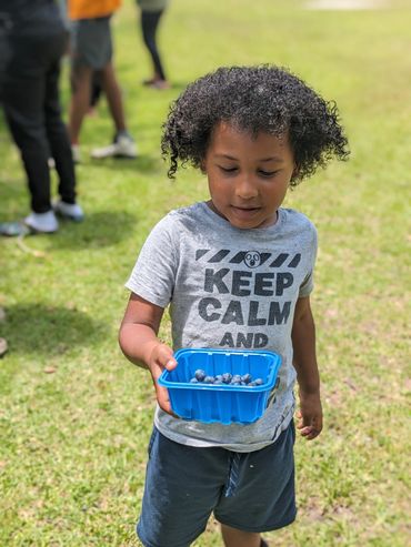 Where laughter blooms free and animals connect hearts.
