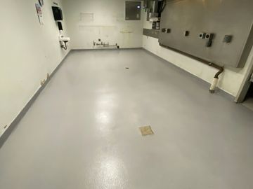 Kitchen at FAA Oklahoma City, Ok - Decorative Concrete - Double broadcast quartz epoxy flooring
