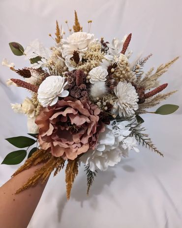 bridal bouquet with artificial flowers, wood flowers, and pampas grass