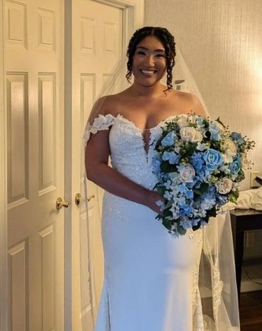 cascading bridal bouquet with white roses and hydrangeas