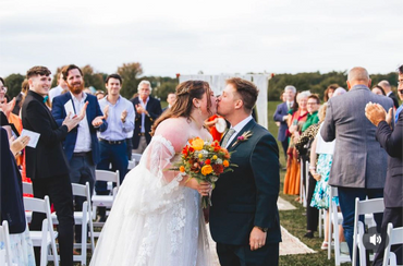 wildflower bridal bouquet with ferns, terracotta flowers and yellow sola wood flowers