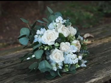 garden style bouquet with white flowers such as roses and peonies