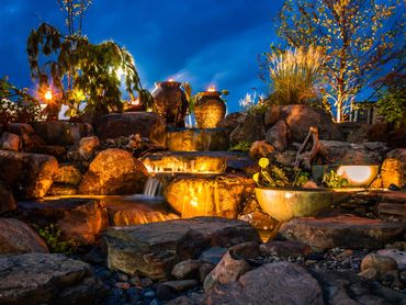 Night lighting on garden waterfall