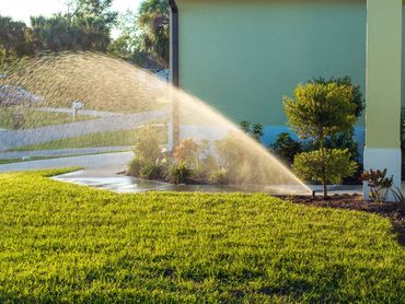 Lawn sprinkler watering a yard
