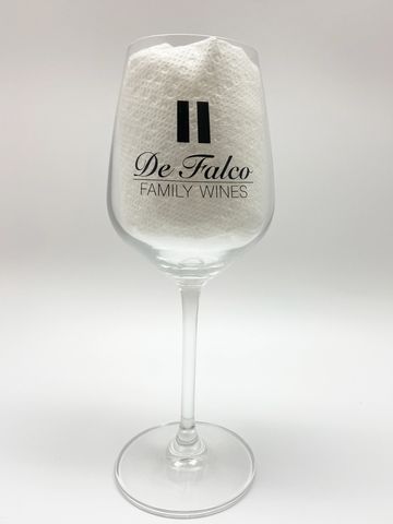 wine glass with defalco family wines logo on it in black
