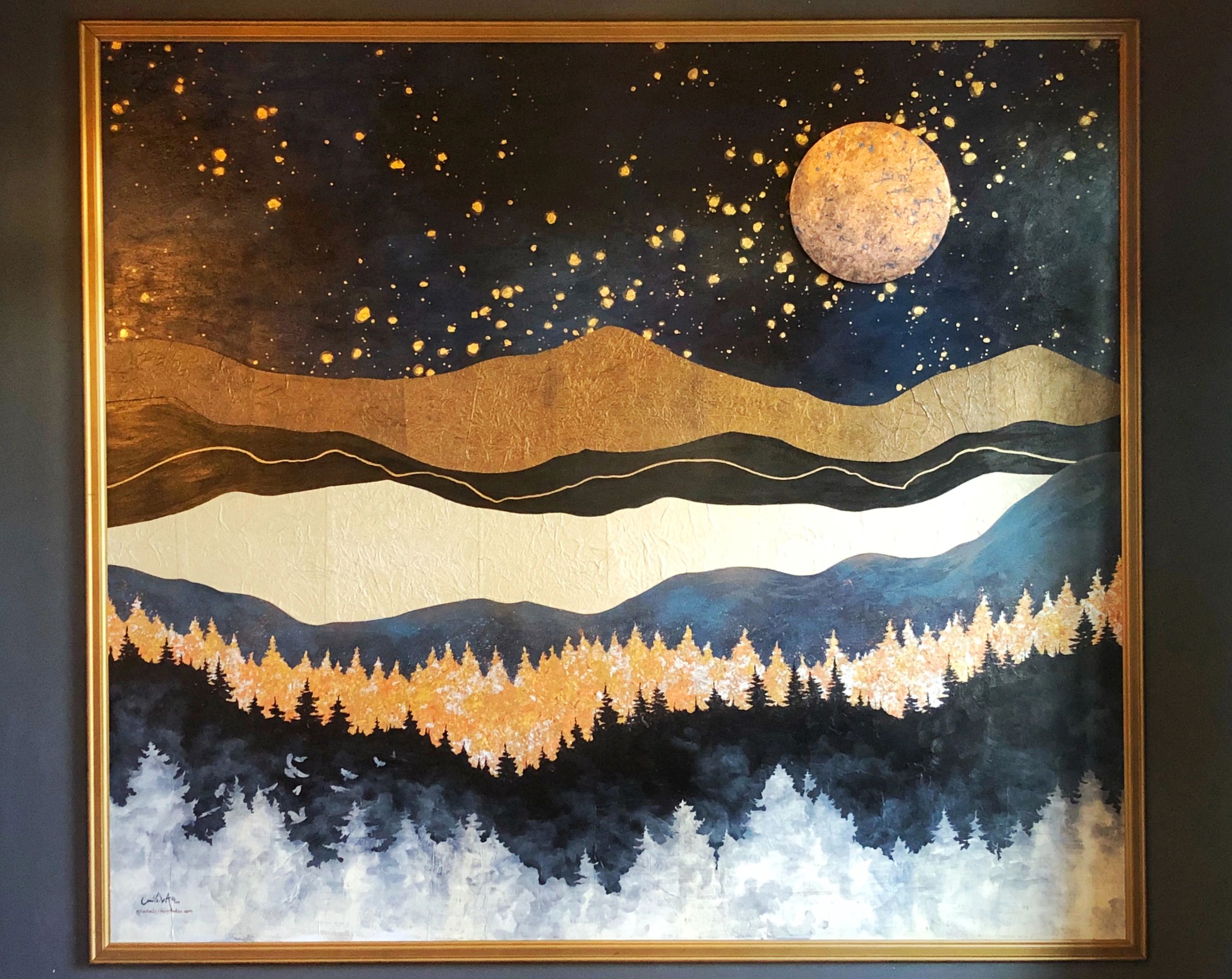 Paper collage interior mural of abstract mountain landscape beneath starry sky