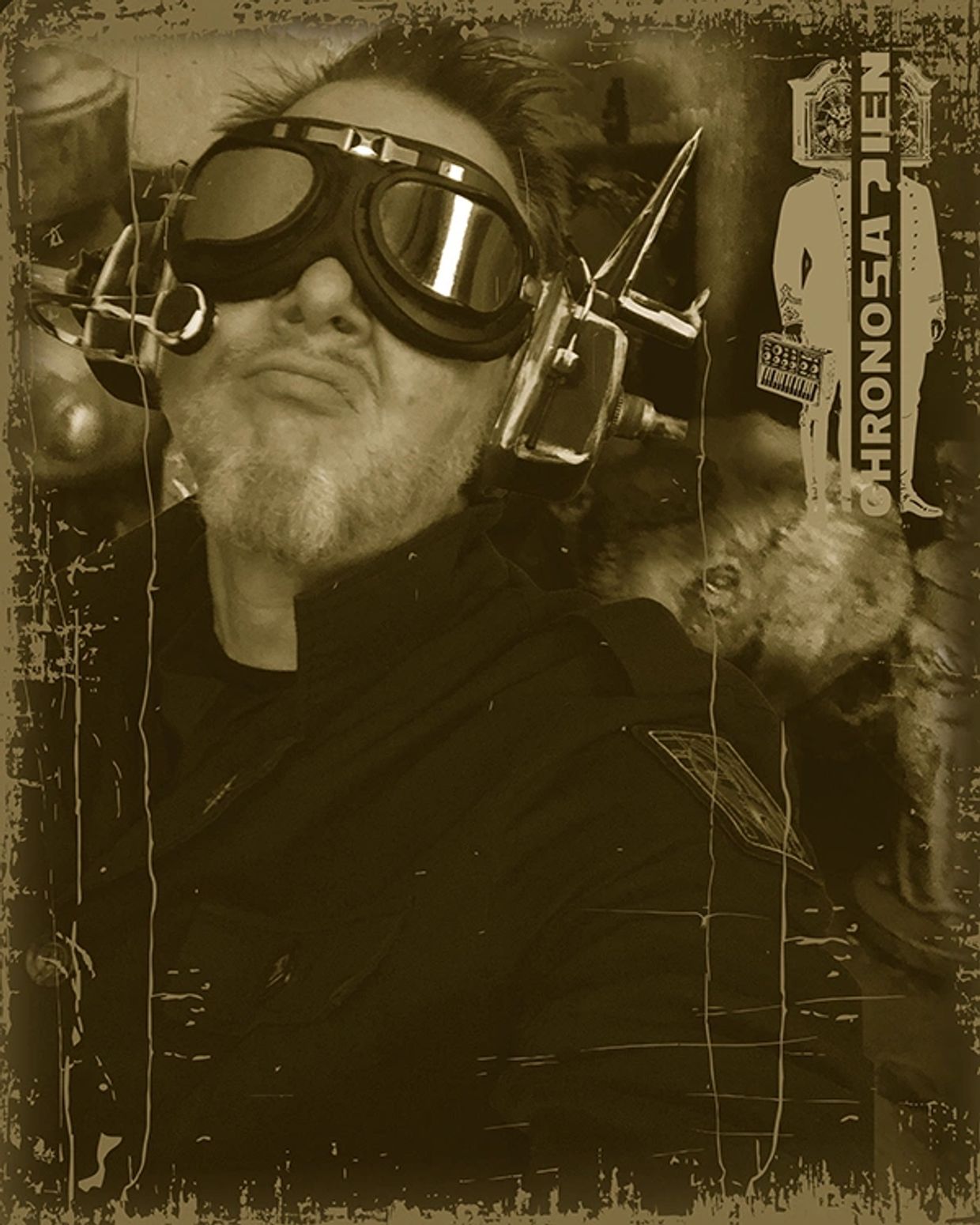 Man wearing steampunk-style goggles and headset in a sepia-toned image.
