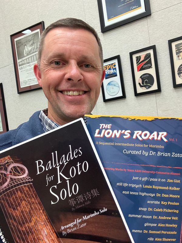 Dr. Brian Zator performing marimba music, showcasing Minoru Miki and the Lion's Roar marimba book