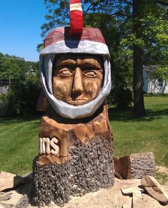 On site Spartans Mascot Chainsaw Carving