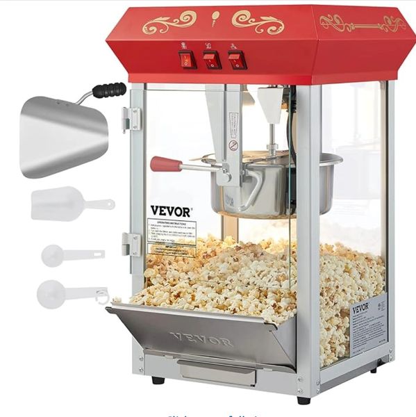 Vintage-style VEVOR popcorn machine with accessories and freshly popped popcorn.