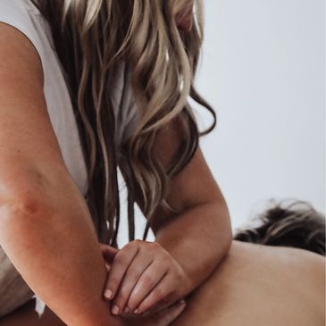 Sarah Hill uses forearms with medium pressure in a relaxation massage